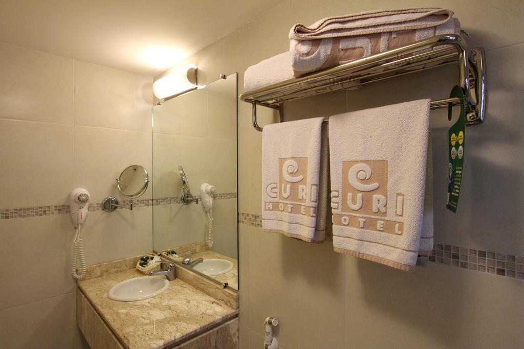 Hotel Curi Executive Pelotas Quarto foto