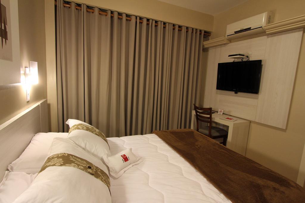 Hotel Curi Executive Pelotas Quarto foto