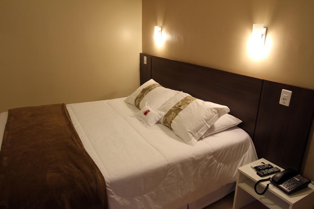 Hotel Curi Executive Pelotas Quarto foto