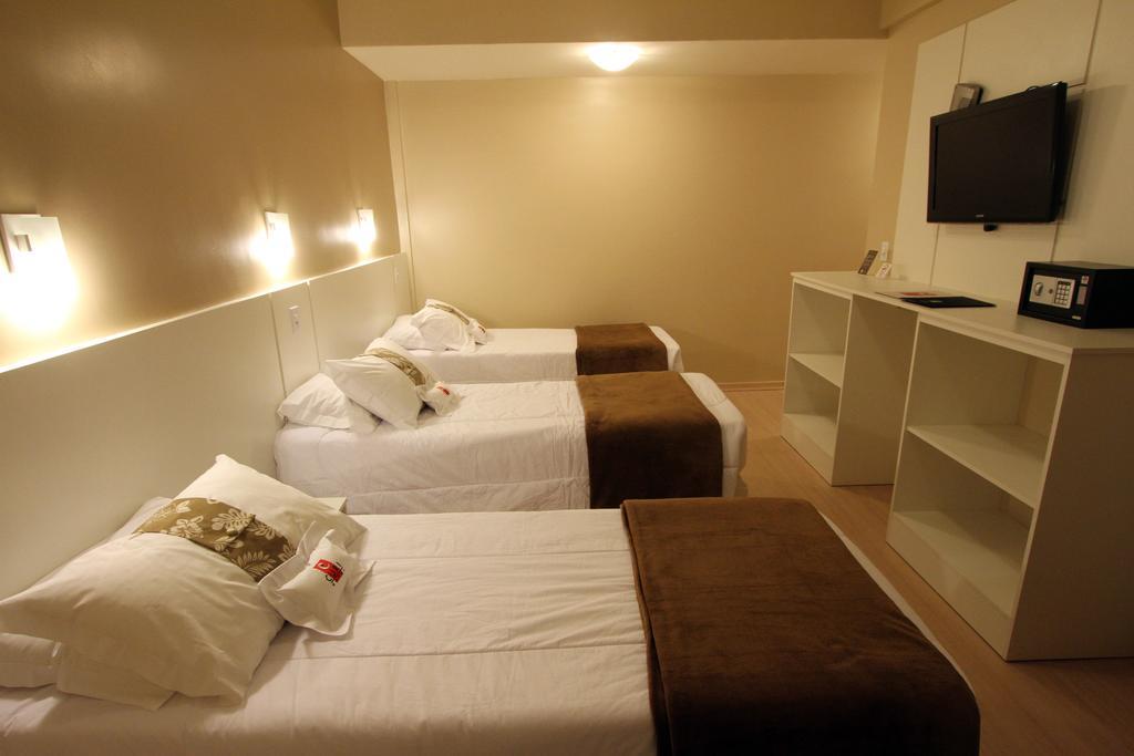 Hotel Curi Executive Pelotas Quarto foto