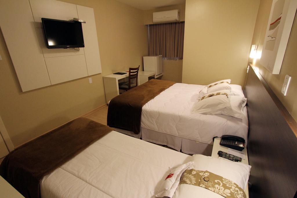Hotel Curi Executive Pelotas Quarto foto